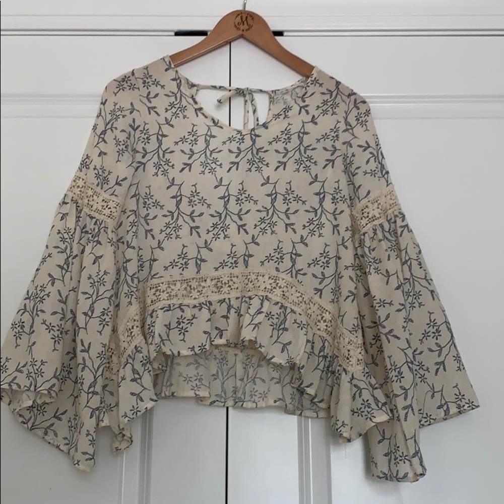 Cream floral vneck bell sleeve crop top
